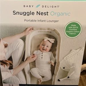 Baby Delight - Snuggle Nest organic portable infant Lounger. Never opened.